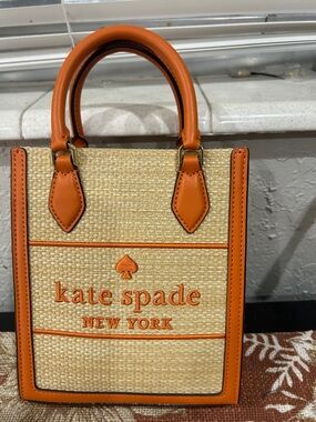 kate spade straw mini tote with orange trim